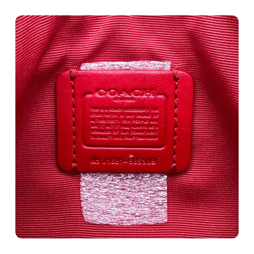 β
Coach RARE Western Rivets Wristlet - Red/Silver β
- Picture 9 of 16